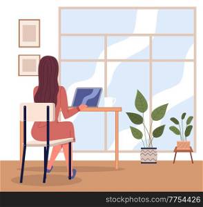Office woman at a desk with a laptop back view. Business woman or a clerk working at her office table near big window. Freelancer at home office. Manager, enterpreneur performs work on a computer. Office woman at a desk with a laptop back view. Freelancer at home office works with computer