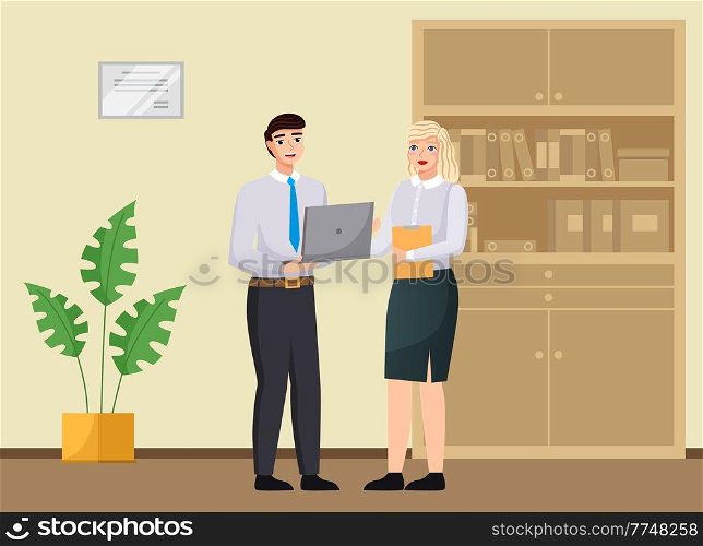 Office workers discussing matters. Businessman dressed in formal clothes with laptop talking. Business meeting and consideration of working issues at workspace. Woman talking to a man colleague. Office workers discussing matters. Businessman dressed in formal clothes with laptop talking