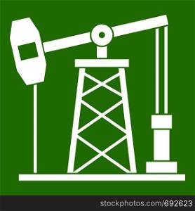 Oil derrick icon white isolated on green background. Vector illustration. Oil derrick icon green