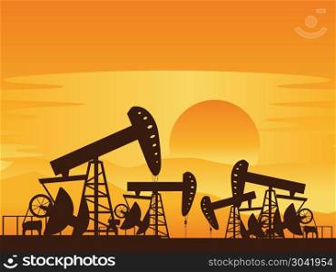 Oil Pump at Sunset. Sunset background and working oil pump silhouette.