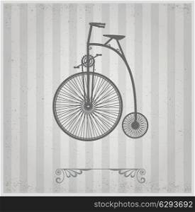 Old bicycle on a gray background