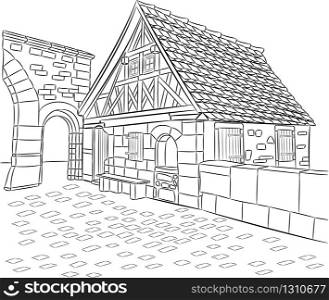 Old medieval half-timbered house in Rothenburg ob der Tauber. Germany. Bavaria. Old stone house in Rothenburg ob der Tauber.