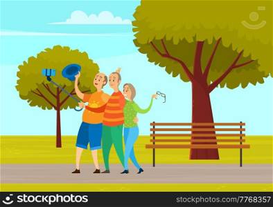 Old people men and woman on walk in city park. Elderly friends having fun hugging and taking selfies. Grandparents walking outdoors together enjoying good warm weather along an alley with green trees. Old people men and woman on walk in city park. Elderly friends having fun hugging and taking selfies