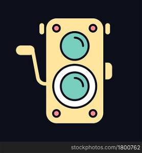 Old photo camera RGB color icon for dark theme. Optical instrument for image capturing. Vintage photography. Isolated vector illustration on night mode background. Simple filled line drawing on black. Old photo camera RGB color icon for dark theme