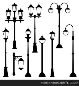 Old street lamps set in monochrome style. Vector illustrations isolate. Urban lantern streetlight classic. Old street lamps set in monochrome style. Vector illustrations isolate