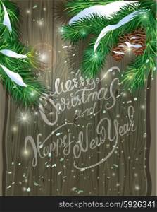 Old Wooden background with painted holiday typography, Christmas fir tree branches and snow. Merry Christmas and Happy New Year calligraphy.