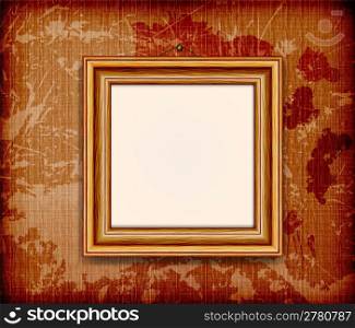 Old wooden frame for photo on the golden fabric background
