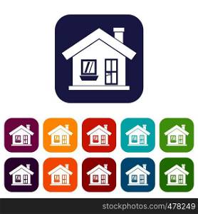 One-storey house with a chimney icons set vector illustration in flat style in colors red, blue, green, and other. One-storey house with a chimney icons set