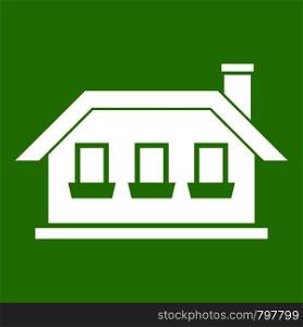 One-storey house with three windows icon white isolated on green background. Vector illustration. One-storey house with three windows icon green