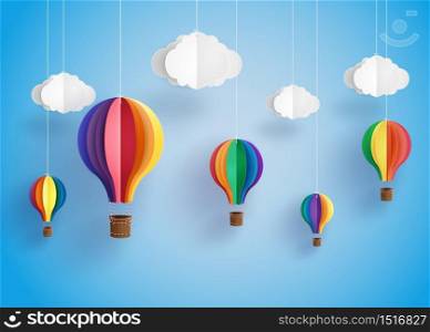Origami made colorful hot air balloon and cloud.paper art style.