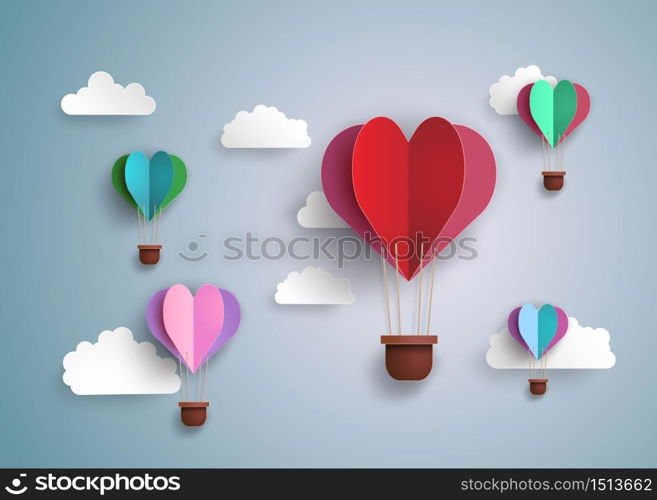 Origami made hot air balloon in a heart shape.