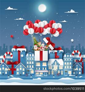 Origami Paper art of cute Christmas character on balloon in town with snowing, Merry Christmas and Happy New Year