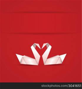 Origami swans on red background. Origami, white folded paper swans on red background.