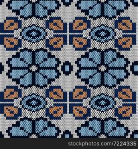 Ornamental knitting seamless vector pattern in blue and orange hues as a fabric texture