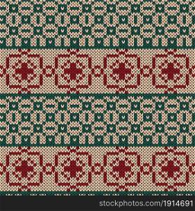 Ornamental knitting seamless vector pattern in green, red and beige colors as a fabric texture