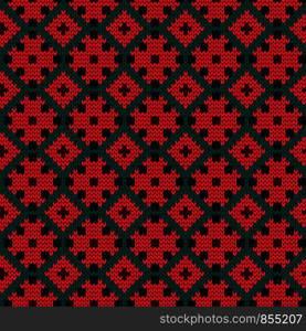 Ornamental knitting seamless vector pattern in turquoise and red colors as a fabric texture