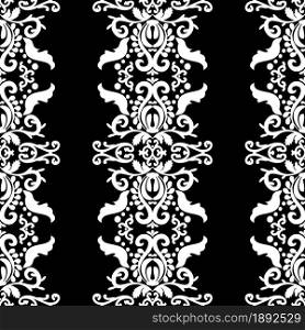 Ornate white pattern on a black background. Seamless pattern, vertical damask ornament. Lace pattern. Black and white color. Vector graphic vintage pattern. For fabric, tile, wallpaper or packaging.