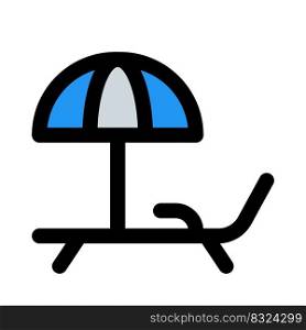 Outdoor beach chair with umbrella on top