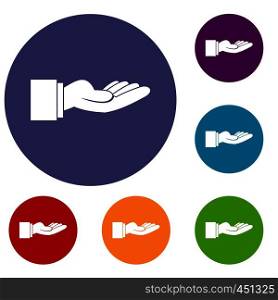 Outstretched hand gesture icons set in flat circle reb, blue and green color for web. Outstretched hand gesture icons set