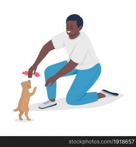 Owner playing with small puppy semi flat color vector character. Sitting figure. Full body person on white. Animal adoption isolated modern cartoon style illustration for graphic design and animation. Owner playing with small puppy semi flat color vector character