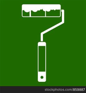 Paint roller icon white isolated on green background. Vector illustration. Paint roller icon green