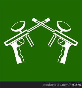 Paintball guns icon white isolated on green background. Vector illustration. Paintball guns icon green