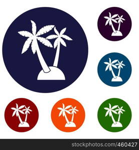 Palm trees icons set in flat circle reb, blue and green color for web. Palm trees icons set