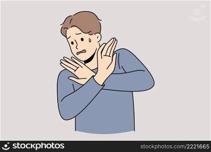 Panic stop and prevention concept. Young stressed man showing stop crossed hands sign feeling no wish to do trying to prevent something vector illustration . Panic stop and prevention concept.