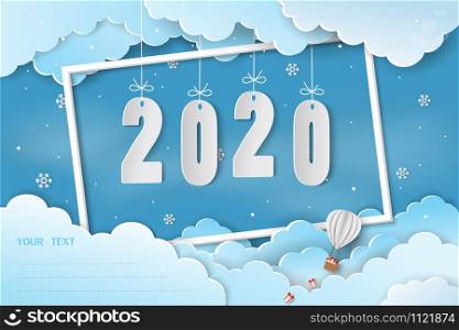 Paper art Happy new year 2020 floating in the air with space for your text,winter season on blue sky background