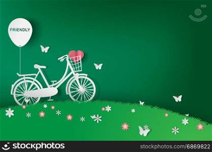 Paper art of Green background with bicycle in the field,eco,friendly,heart