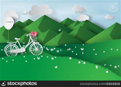 Paper art of green landscape mountain view with bicycle in the field,eco,friendly,heart,vector