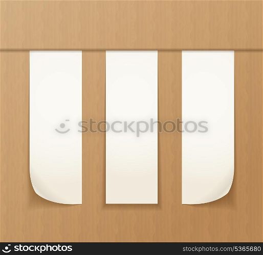 Paper banners on the cardboard background