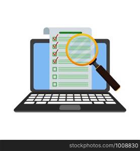 paper check list on laptop under magnifying glass. check list on laptop under magnifying glass