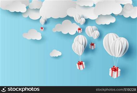 Paper cut and craft of Background with clouds on blue sky.Landscape for sunlight on cloudy.Summer season Hot concept.Summer time by white balloons giftbox floating.Paper art.vector.illustration.EPS10