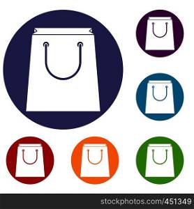 Paper shopping bag icons set in flat circle reb, blue and green color for web. Paper shopping bag icons set
