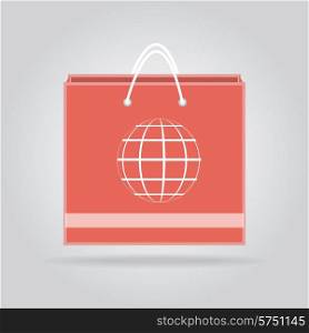 Paper shopping bag with world sphere on gray background