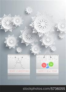 Paper shopping bags and snowflakes. Christmas holidays