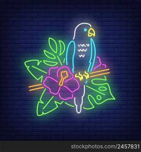 Parrot neon sign. Blue tropical bird on blooming twig. Glowing banner or billboard elements. Vector illustration in neon style for summer, tropical vacation, paradise