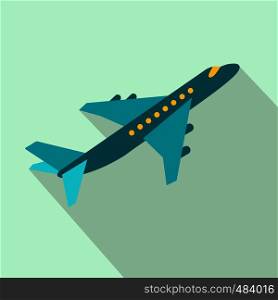 Passenger airplane flat icon on a light blue background. Passenger airplane flat icon