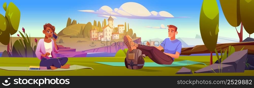 People having picnic on sea coast with town on island. Vector cartoon illustration of summer mediterranean landscape with girl and man sitting on mats with books, backpack, cup and phone. Mediterranean landscape with people having picnic