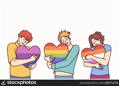 People hugging hearts painted in colors of LGBT and LGBTQ flags making freedom of choice in sex and lifestyle. concept of public tolerance for people from LGBT pride community or transgender people . People hugging hearts painted in colors of LGBT and LGBTQ flags making freedom of choice in sex 