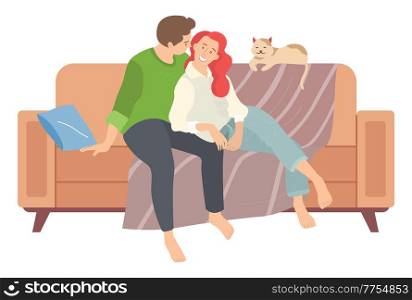 People in relationship sitting on sofa with their cat. Man and woman together relaxing on comfortable couch in the evening. Couple in love isolated on white background. Kitten owners cuddle at home. People in relationship sitting on sofa with their cat. Man and woman together relaxing on the couch