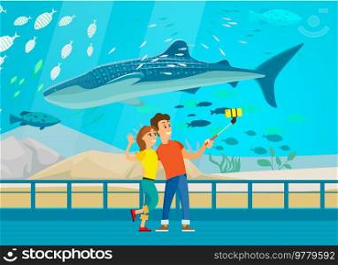 People watching underwater scenery with sea animals in aquarium. Underwater fauna with large whale. Oceanarium visitors look at fish in aquarium. Couple taking selfie with humpback whale in oceanarium. People watch underwater scenery with sea fauna in aquarium. Couple taking selfie with humpback whale