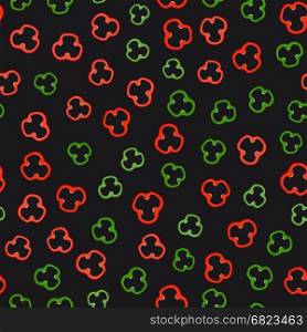 Pepper slices pattern. Red and green pepper slices on black background. Seamless pattern with vegetables.