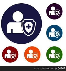 Person and medical cross protection shield icons set in flat circle reb, blue and green color for web. Person and medical cross protection shield icons