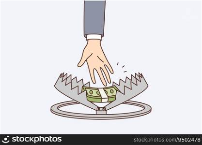 Person hand reaches for money in trap, symbolizing risky income or danger when taking mortgage and loan. Person who takes dirty money risks falling in trap and getting into trouble.. Person hand reaches for money in trap, symbolizing risky income or danger when taking mortgage