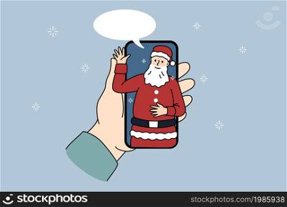 Person hold cellphone talk on video call with Santa Claus on home lockdown or quarantine. Speaking with Christmas father on virtual webcam event on smartphone. New Year. Vector illustration. . Person talk on video call with Santa Claus