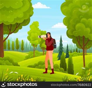 Photographer woman taking photo of nature, walking with backpack outdoors at green hills, female using professional equipment, reflex camera, girl photographing wild summer nature in forest or wood. Photographer woman taking photo of nature, walking with backpack at green hills, reflex camera