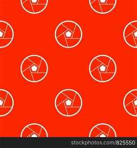 Photographic lens pattern repeat seamless in orange color for any design. Vector geometric illustration. Photographic lens pattern seamless