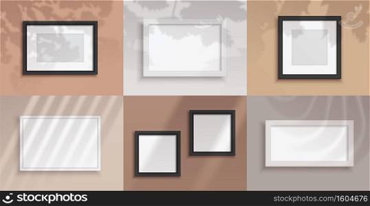 Picture frames. Realistic blank borders for photographs. Square and rectangle decorative interior objects on wall with overlay shadows effect from plants and windows. Vector exhibition templates set. Picture frames. Realistic blank borders for photographs. Square decorative interior objects on wall. Overlay shadows effect from plants and windows. Vector exhibition templates set